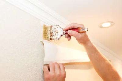 Pose de papier peint à Espinas — revêtements muraux et toiles de verre